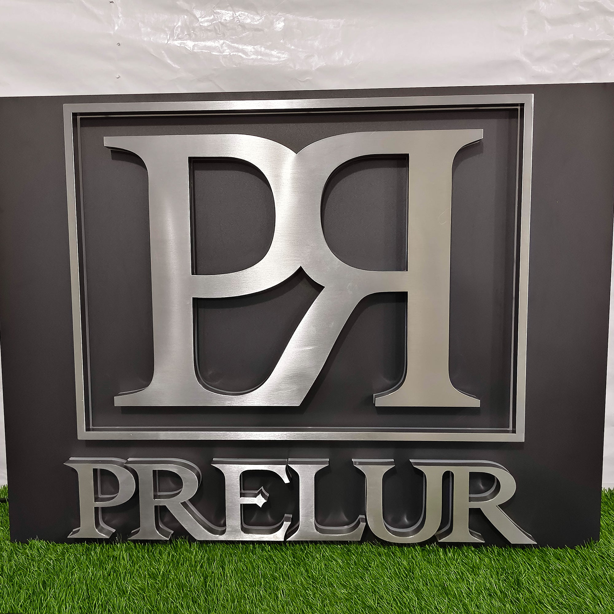 Custom Backlit Channel Letters | Black Brushed Finish | Storefront Signs and Business Branding