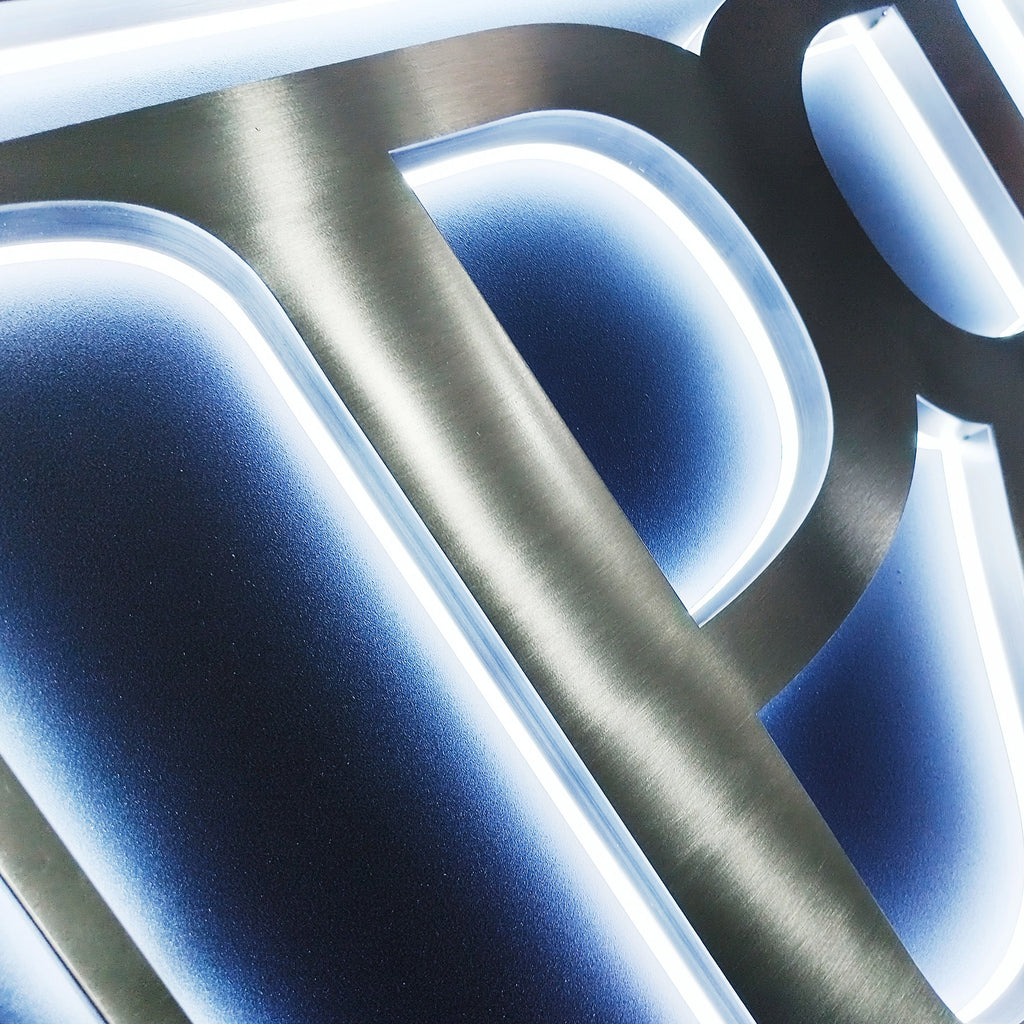 Custom Backlit Channel Letters | Black Brushed Finish | Storefront Signs and Business Branding